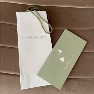 Van Cleef & Arpels receipt’s envelope and small shopping bag